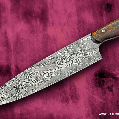 10.5" bladed Carbon Damascus Chef with Curly Koa Handle left view
